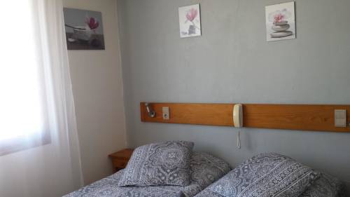 Imagen de la habitación del Hotel Maison Des Croisades. Foto 13