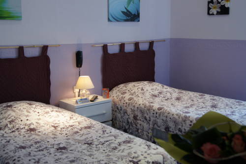 Imagen de la habitación del Hotel Maison Des Dunes. Foto 4