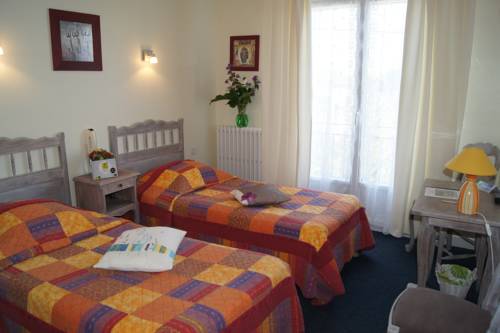 Imagen de la habitación del Hotel Maison Des Dunes. Foto 6