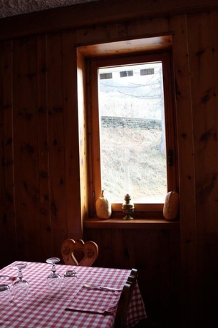 Imagen del bar/restaurante del Hotel Maison Des Myrtilles. Foto 3