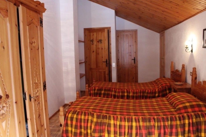 Imagen de la habitación del Hotel Maison Des Myrtilles. Foto 6