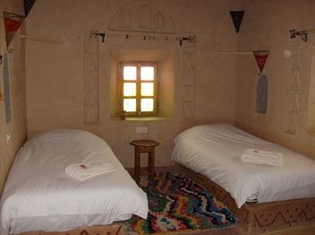 Imagen de la habitación del Hotel Maison D'hotes Dar Timitar. Foto 13