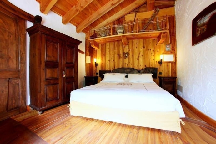 Imagen de la habitación del Hotel Maison Dominique. Foto 4