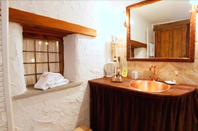 Imagen de la habitación del Hotel Maison Dominique. Foto 16