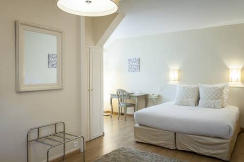 Imagen de la habitación del Hotel Maison Doucet. Foto 4