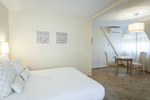 Imagen de la habitación del Hotel Maison Doucet. Foto 7