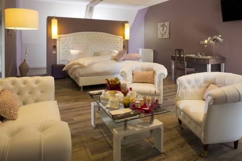 Imagen de la habitación del Hotel Maison Doucet. Foto 14