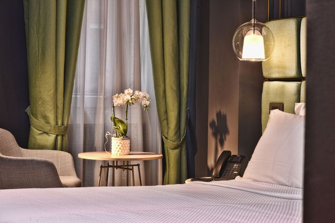 Imagen de la habitación del Hotel Maison Ducal. Foto 12