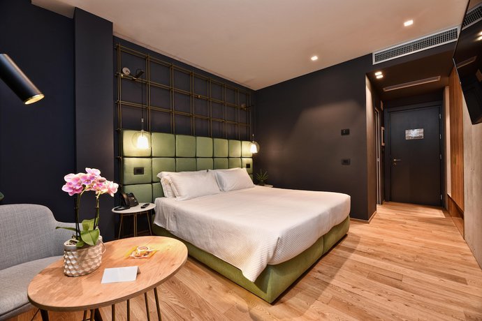 Imagen de la habitación del Hotel Maison Ducal. Foto 17