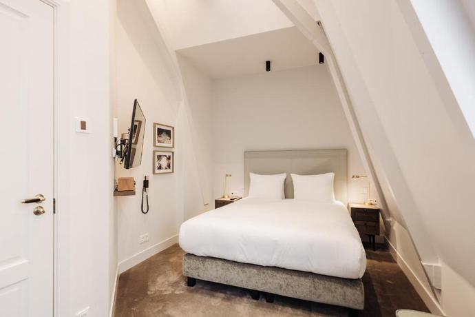 Imagen de la habitación del Hotel Maison ELLE Amsterdam. Foto 7