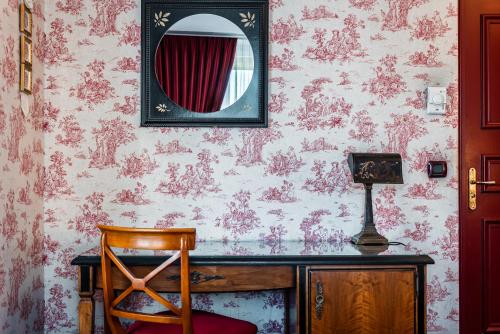 Imagen de la habitación del Hotel Maison Eugenie. Foto 17