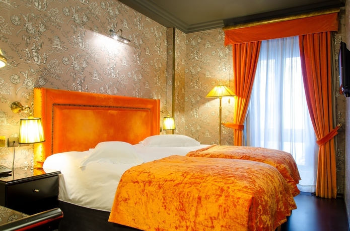 Imagen de la habitación del Hotel Maison Grecque. Foto 2