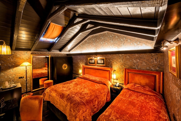 Imagen de la habitación del Hotel Maison Grecque. Foto 6