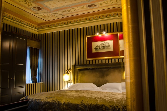 Imagen de la habitación del Hotel Maison Grecque. Foto 7