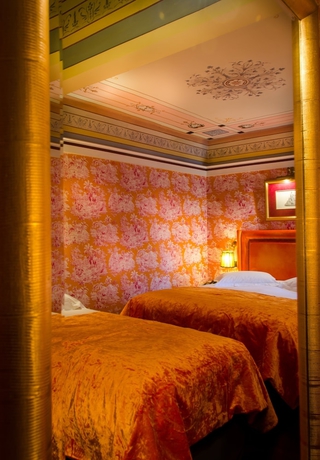 Imagen de la habitación del Hotel Maison Grecque. Foto 9