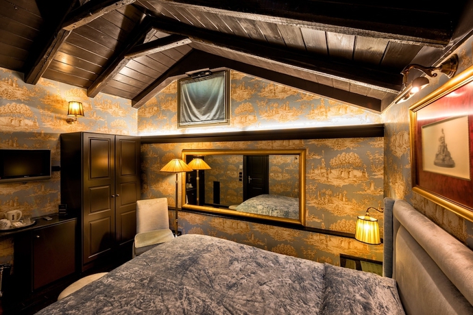 Imagen de la habitación del Hotel Maison Grecque. Foto 12