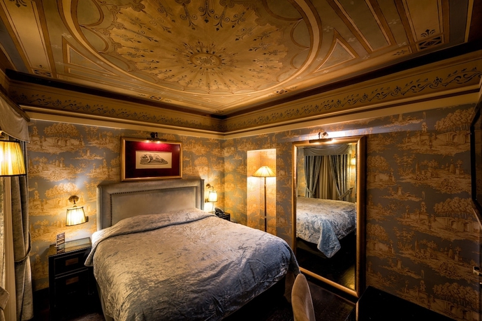 Imagen de la habitación del Hotel Maison Grecque. Foto 15