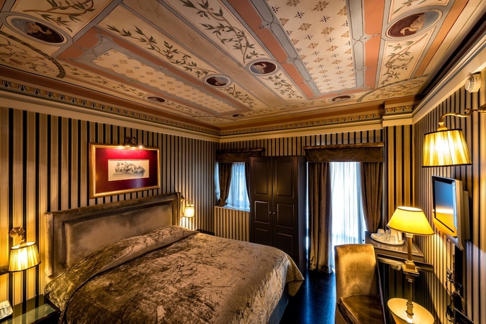 Imagen de la habitación del Hotel Maison Grecque. Foto 16