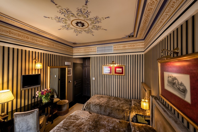 Imagen de la habitación del Hotel Maison Grecque. Foto 17