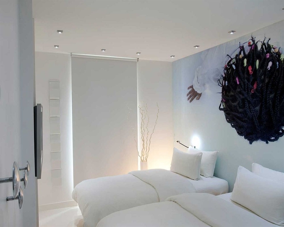 Imagen de la habitación del Hotel Maison Lenoir. Foto 11