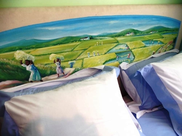 Imagen de la habitación del Hotel Maison Lovasoa. Foto 7