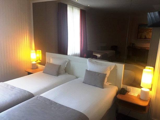 Imagen de la habitación del Hotel Maison Lutetia R. Foto 11
