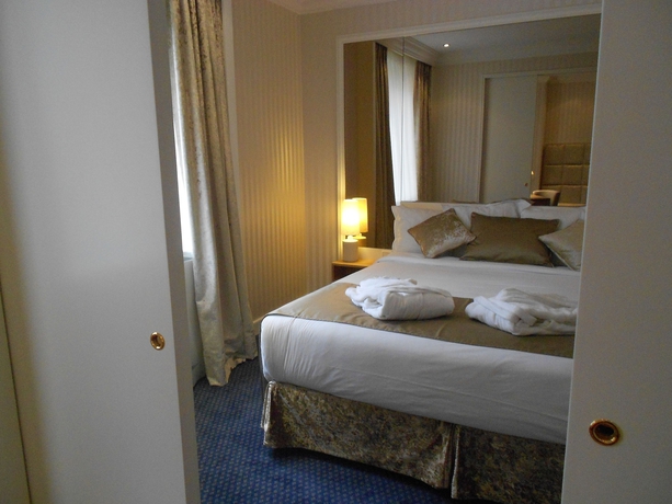 Imagen de la habitación del Hotel Maison Lutetia R. Foto 15