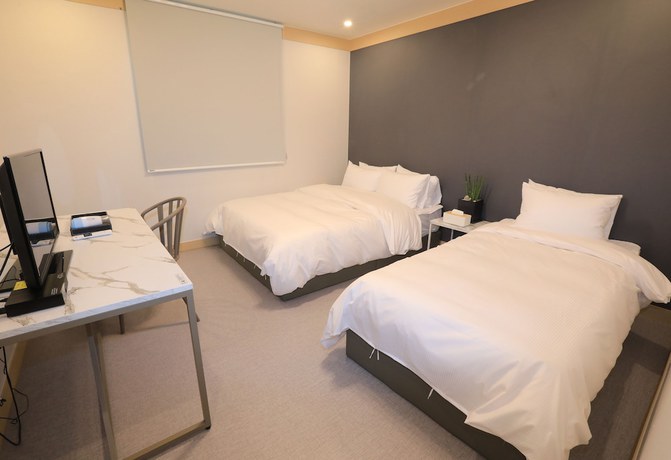 Imagen de la habitación del Hotel Maison Mini. Foto 2