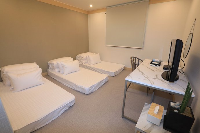 Imagen de la habitación del Hotel Maison Mini. Foto 4