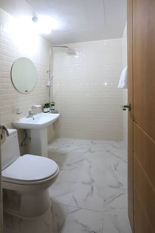 Imagen de la habitación del Hotel Maison Mini. Foto 5