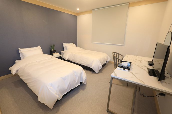 Imagen de la habitación del Hotel Maison Mini. Foto 6