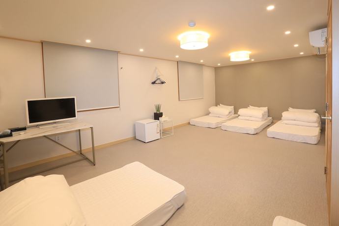 Imagen de la habitación del Hotel Maison Mini. Foto 8