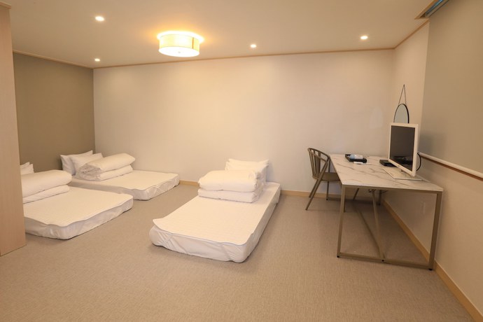 Imagen de la habitación del Hotel Maison Mini. Foto 11