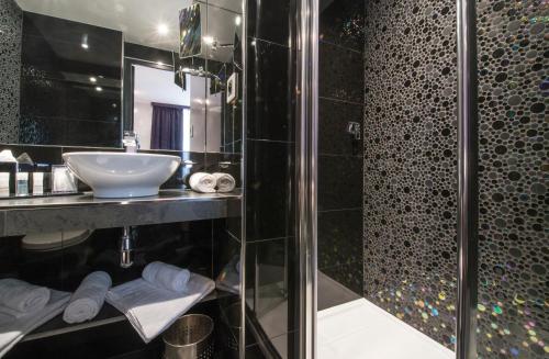 Imagen de la habitación del Hotel Maison Monceau. Foto 7