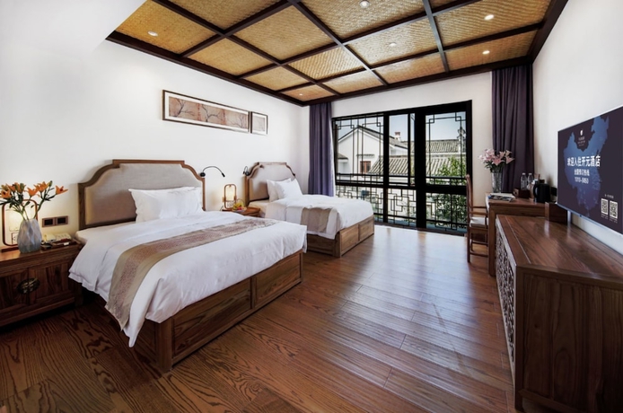 Imagen de la habitación del Hotel Maison New Century Nanxun Huzhou. Foto 5