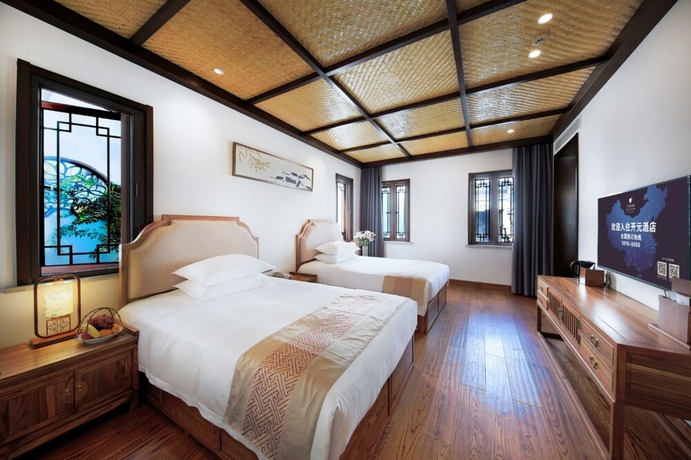 Imagen de la habitación del Hotel Maison New Century Nanxun Huzhou. Foto 8