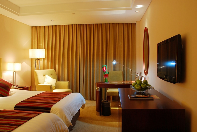 Imagen de la habitación del Hotel Maison New Century Ningbo. Foto 6