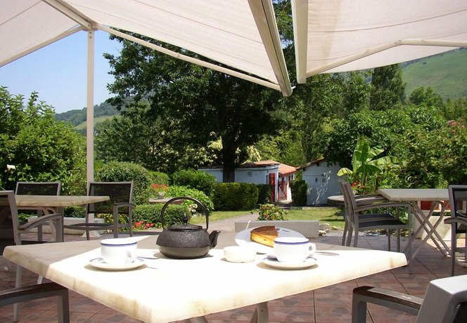 Imagen de la habitación del Hotel Maison Oppoca. Foto 3