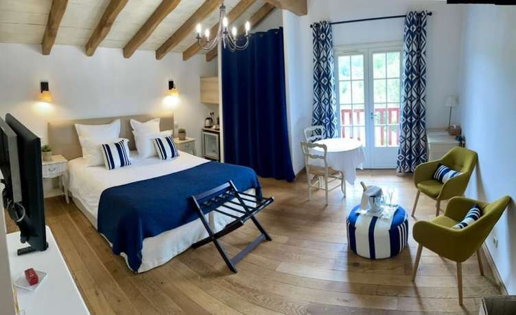 Imagen de la habitación del Hotel Maison Oppoca. Foto 5