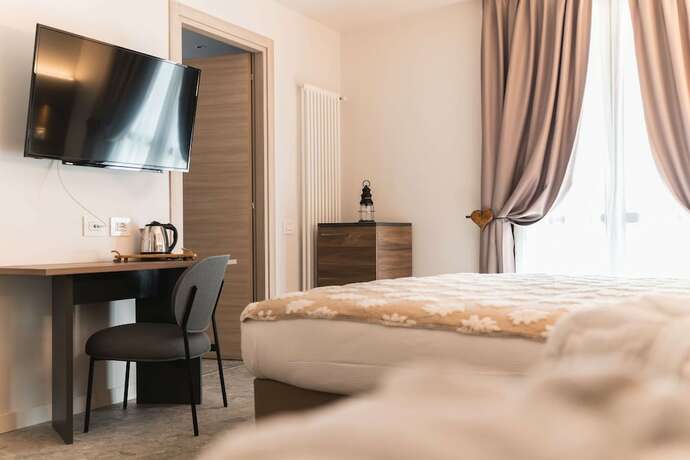 Imagen de la habitación del Hotel Maison Poluc Apartment. Foto 15