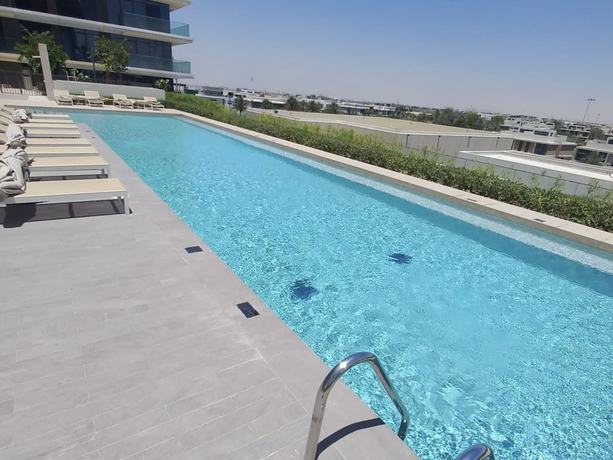 Imagen de la piscina del Hotel Maison Privee - Graceful Apt In Prestigious Dubai Hills Close To The Golf Course. Foto 18