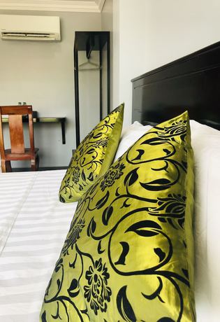 Imagen de la habitación del Hotel Maison Rivera Guest House. Foto 9