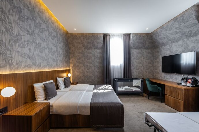 Imagen de la habitación del Hotel Maison Royale. Foto 17