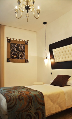 Imagen de la habitación del Hotel Maison Spada. Foto 17