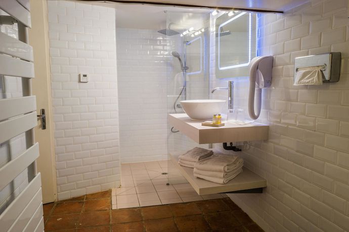 Imagen de la habitación del Hotel Maison des Peyrat. Foto 4