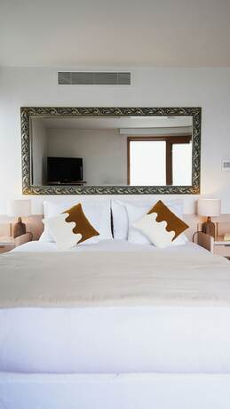 Imagen de la habitación del Hotel Maison du Lac Boutique. Foto 11