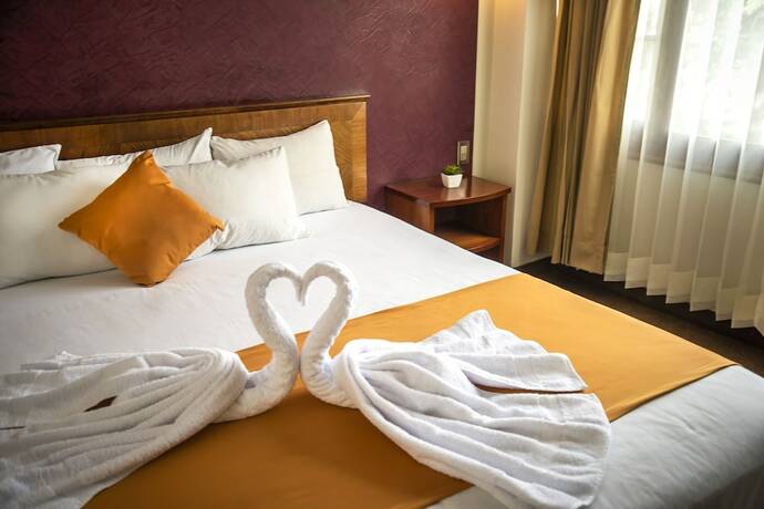 Imagen de la habitación del Hotel Maison du Soleil. Foto 11