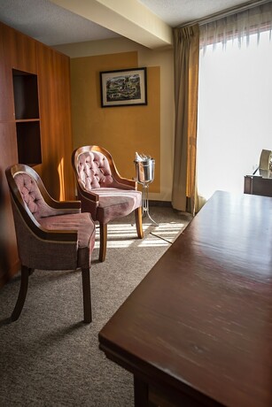 Imagen de la habitación del Hotel Maison du Soleil. Foto 17