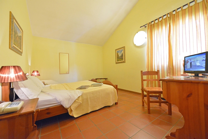 Imagen de la habitación del Hotel Maisonnette. Foto 8