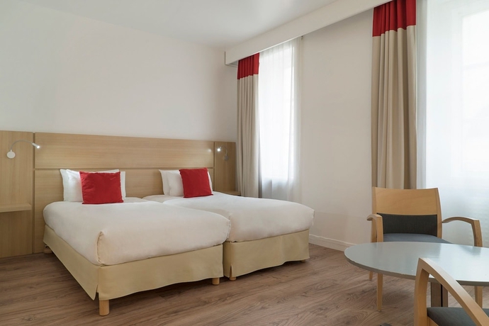 Imagen de la habitación del Hotel Maisons Du Monde and Suites - La Rochelle Vieux Port. Foto 2